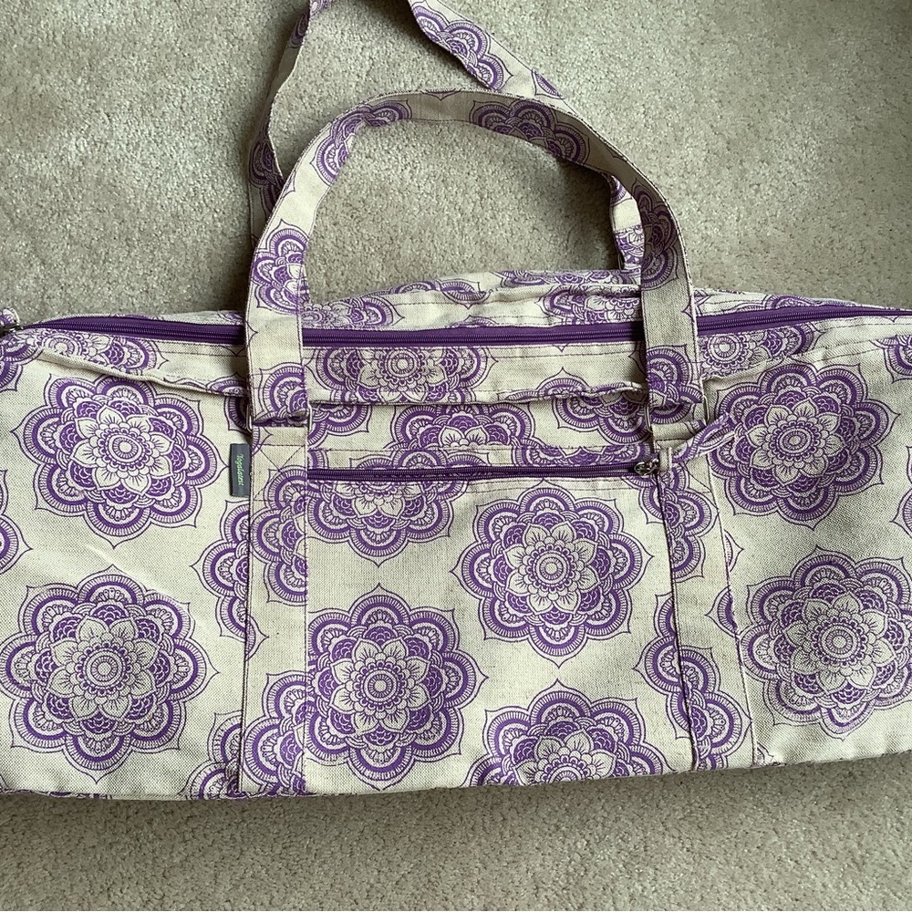 Yogalatest yoga mat carrier.